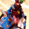 和紙の日本人形の画像