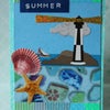 灯台と貝殻のATCの画像