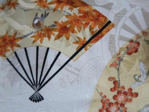 千總の四季花鳥扇子図の小紋に川島織物の雲に四方瓜に菱文様の織なごや 