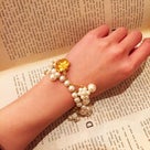 KENZO pearl × gold bracelet & bag charmの記事より