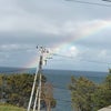 海に架かる虹の橋の画像