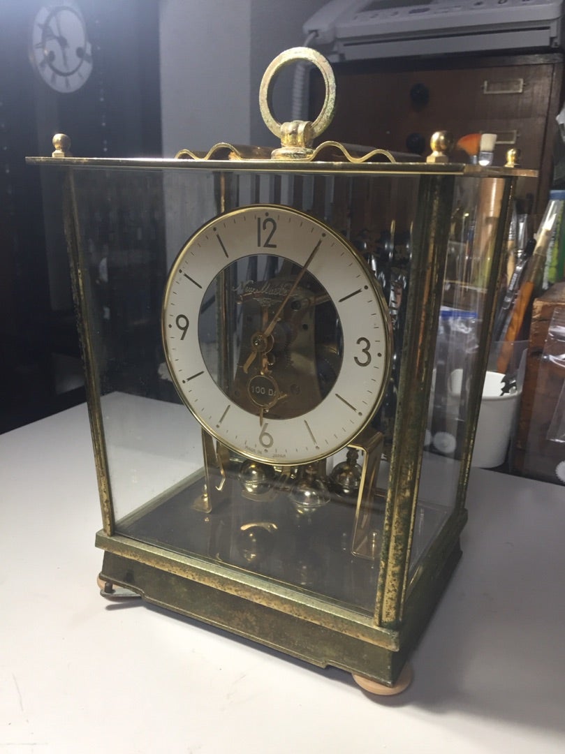 日新時計 New Master 100DAY回転振り子式時計とスヌーピーの時計