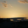 屋上より夕日を見つめるの画像