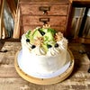 誕生日　#バースデーケーキ　白桃のコンポートとメロンのケーキの画像