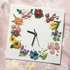 ペーパークイリングの花時計の画像